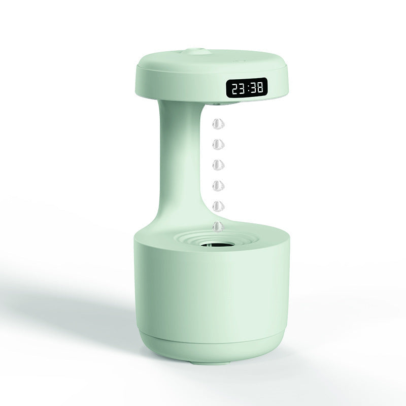 Mint Green humidifier in action with digital time display feature
