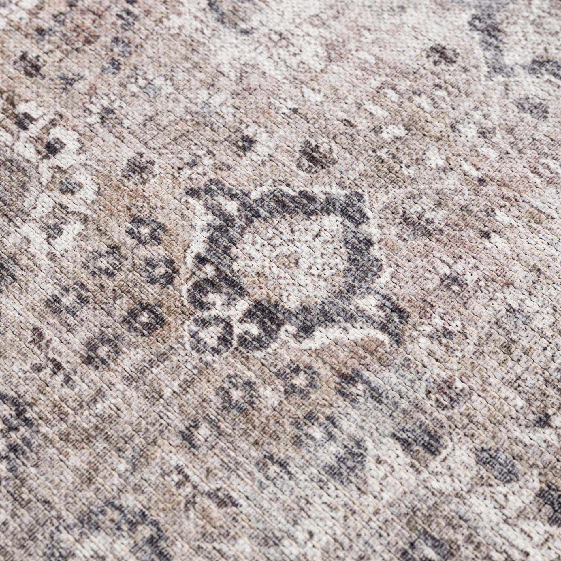 Close-up Ganyangan washable rug design and stitching detail view