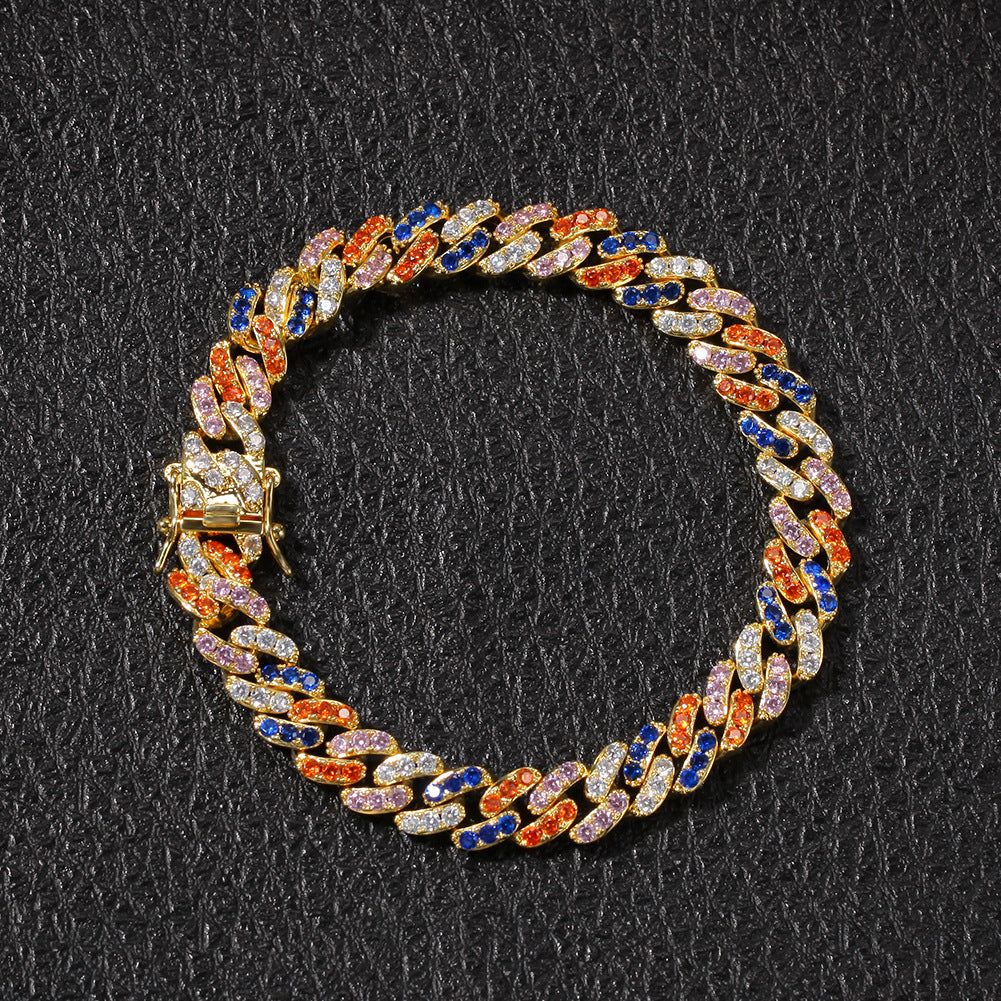 Multi-color Cuban chain necklace on black background jewelry display