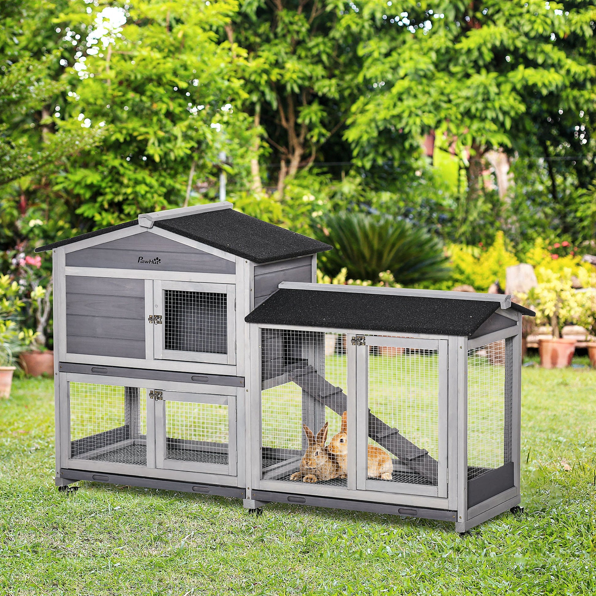 Wooden rabbit guinea pig hutch with wheels displayed in garden setting
