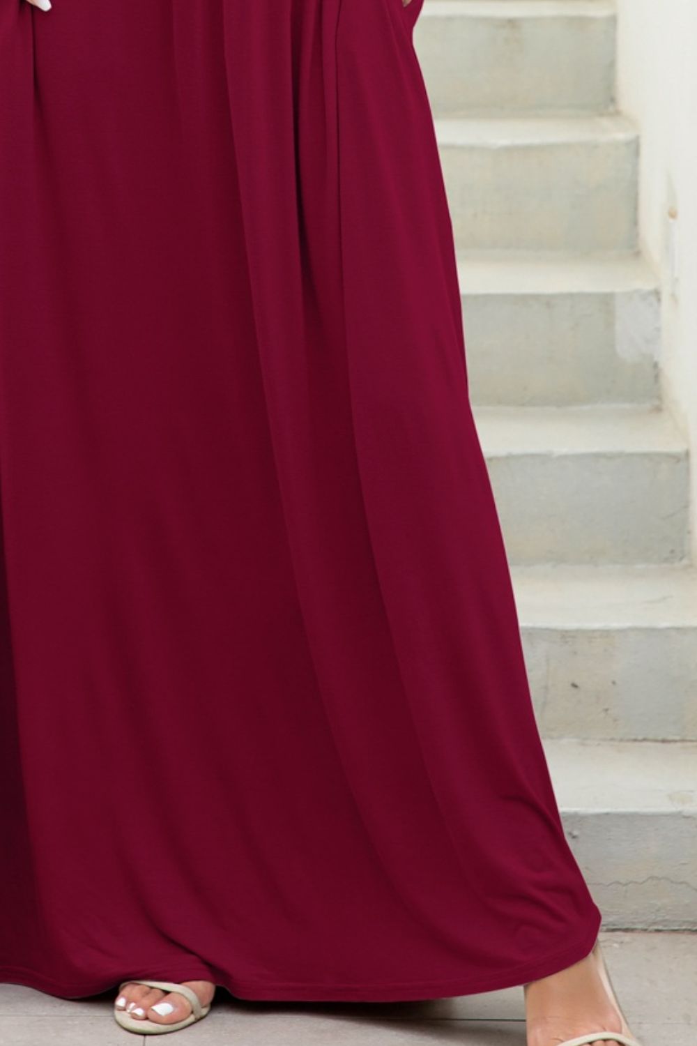 Round neck dress with pockets close-up material view model wearing wine colourway
