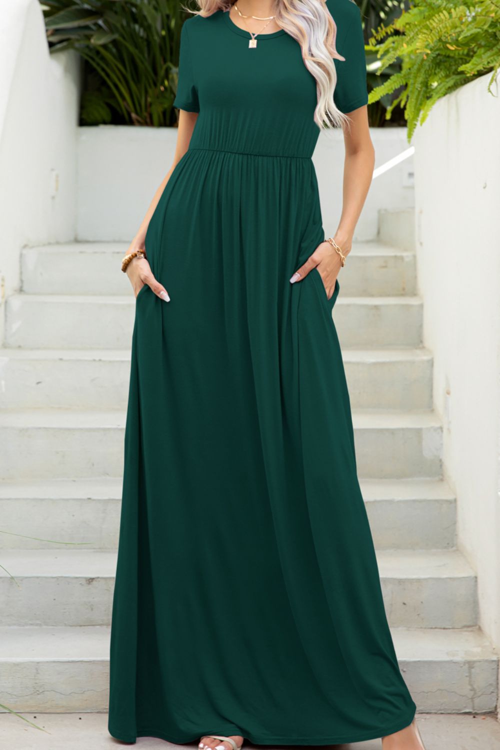 Round neck dress with pockets front view model wearing forest colourway
