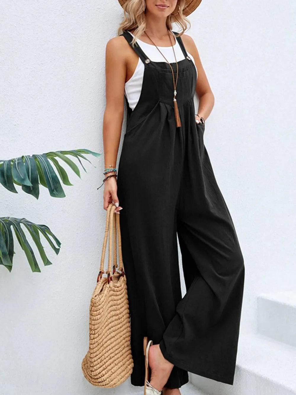 Black square neck wide strap overalls front view on model
