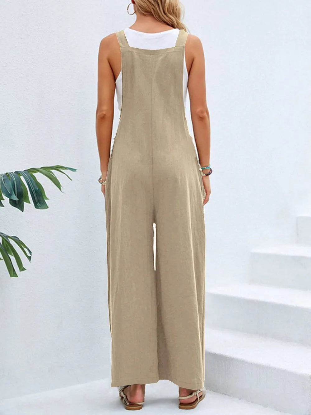 Khaki square neck wide strap overalls back view on model
