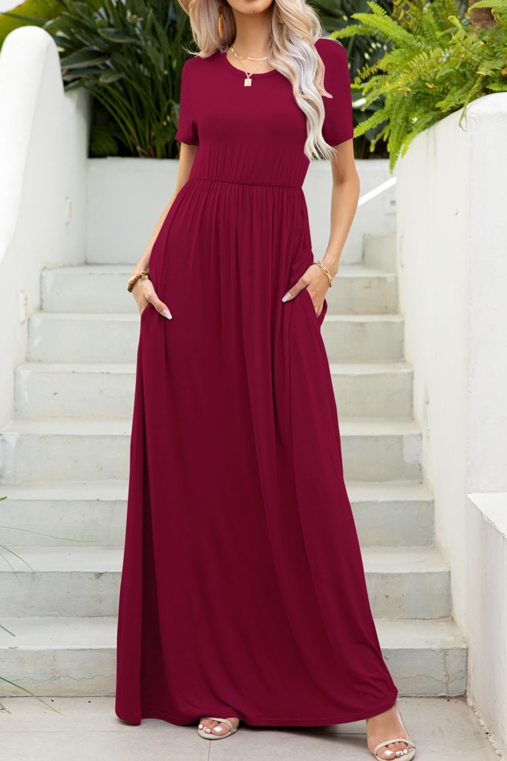 Round neck dress with pockets back view model wearing wine colourway
