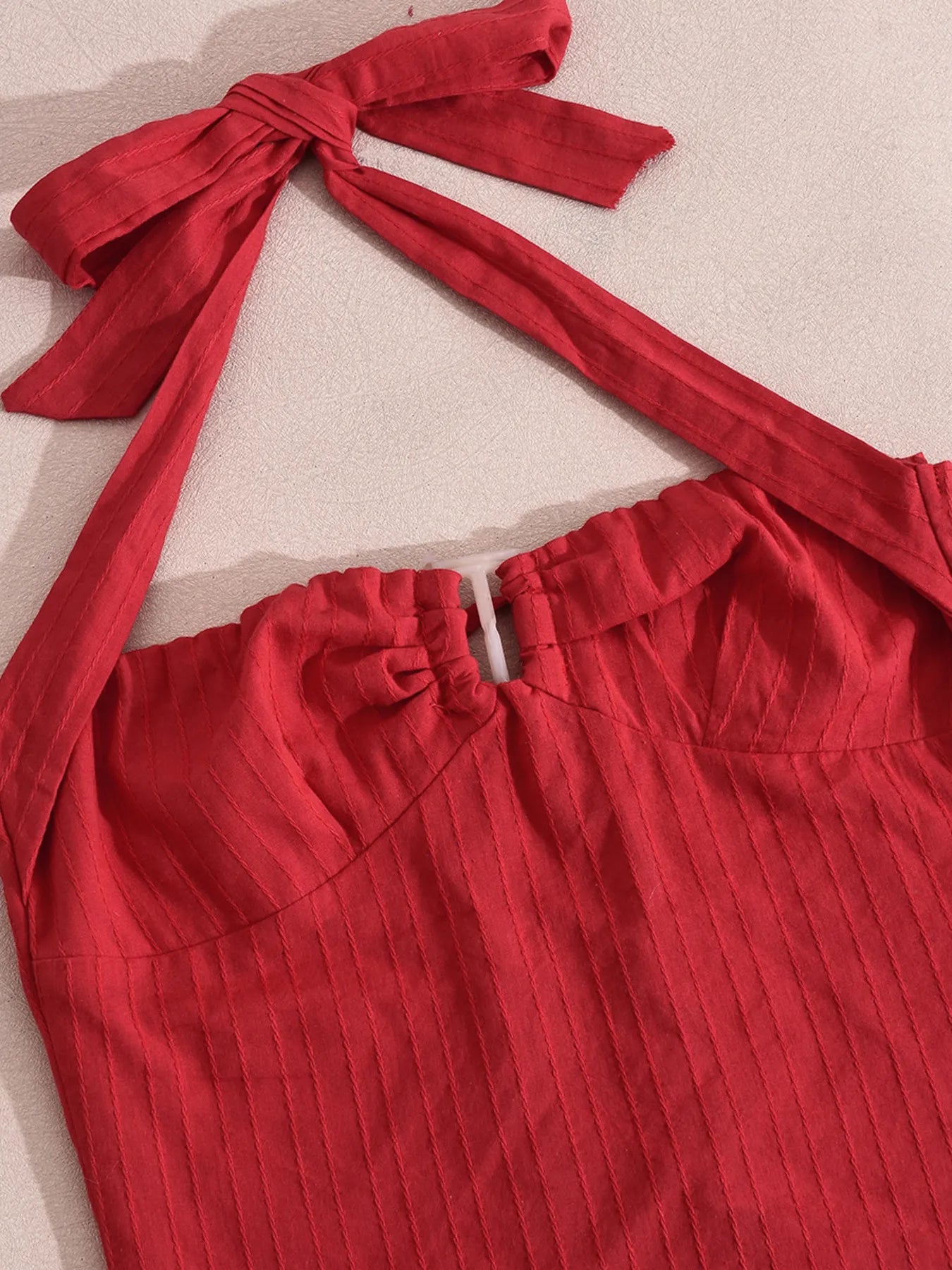 Halter neck cami top deep red close-up front view product display
