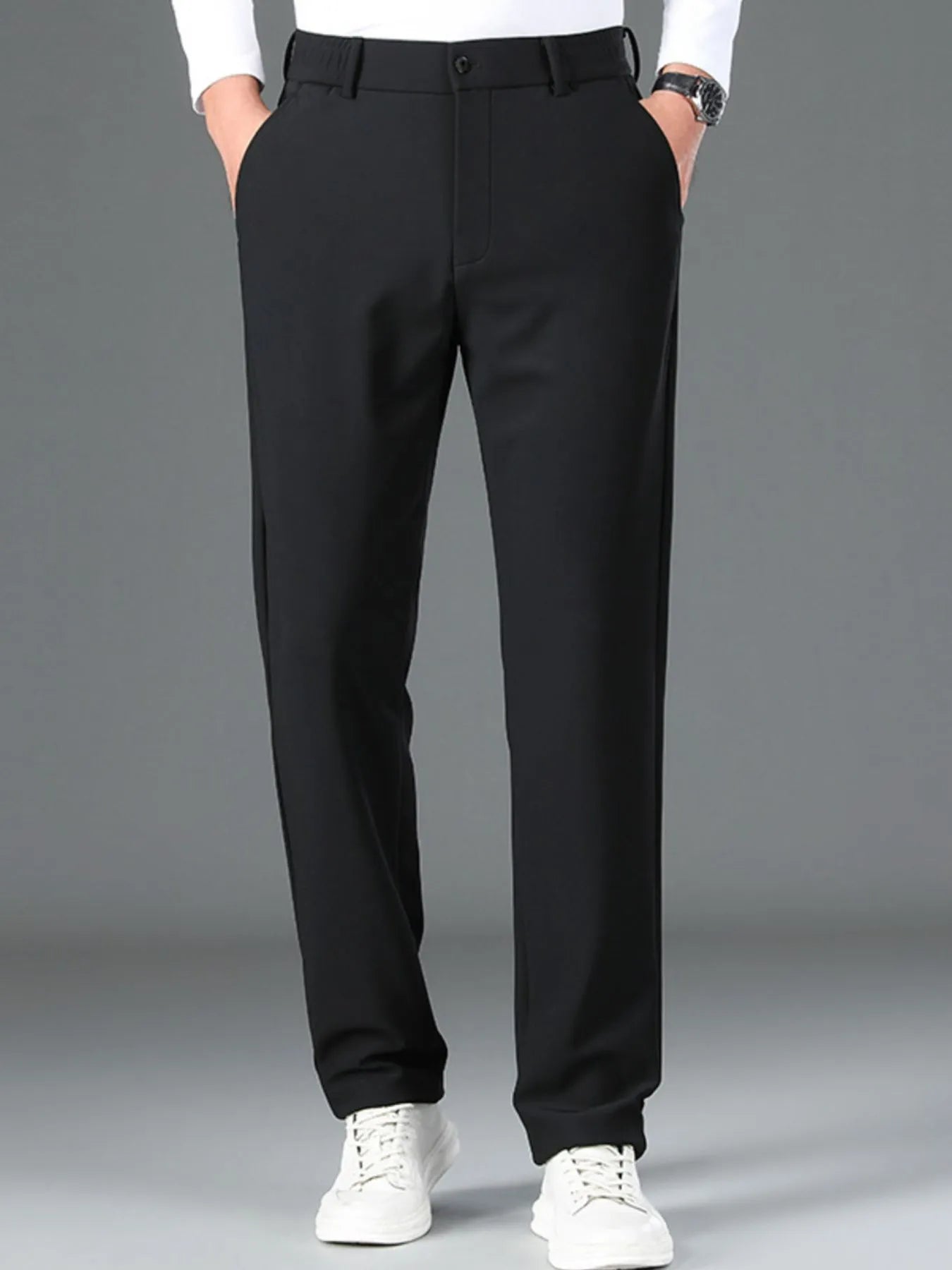 Men's loose fit pants with pockets - front view in black


