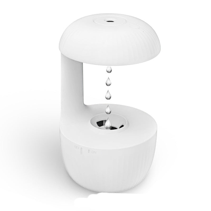 Overhead view humidifier in action mist output top angle
