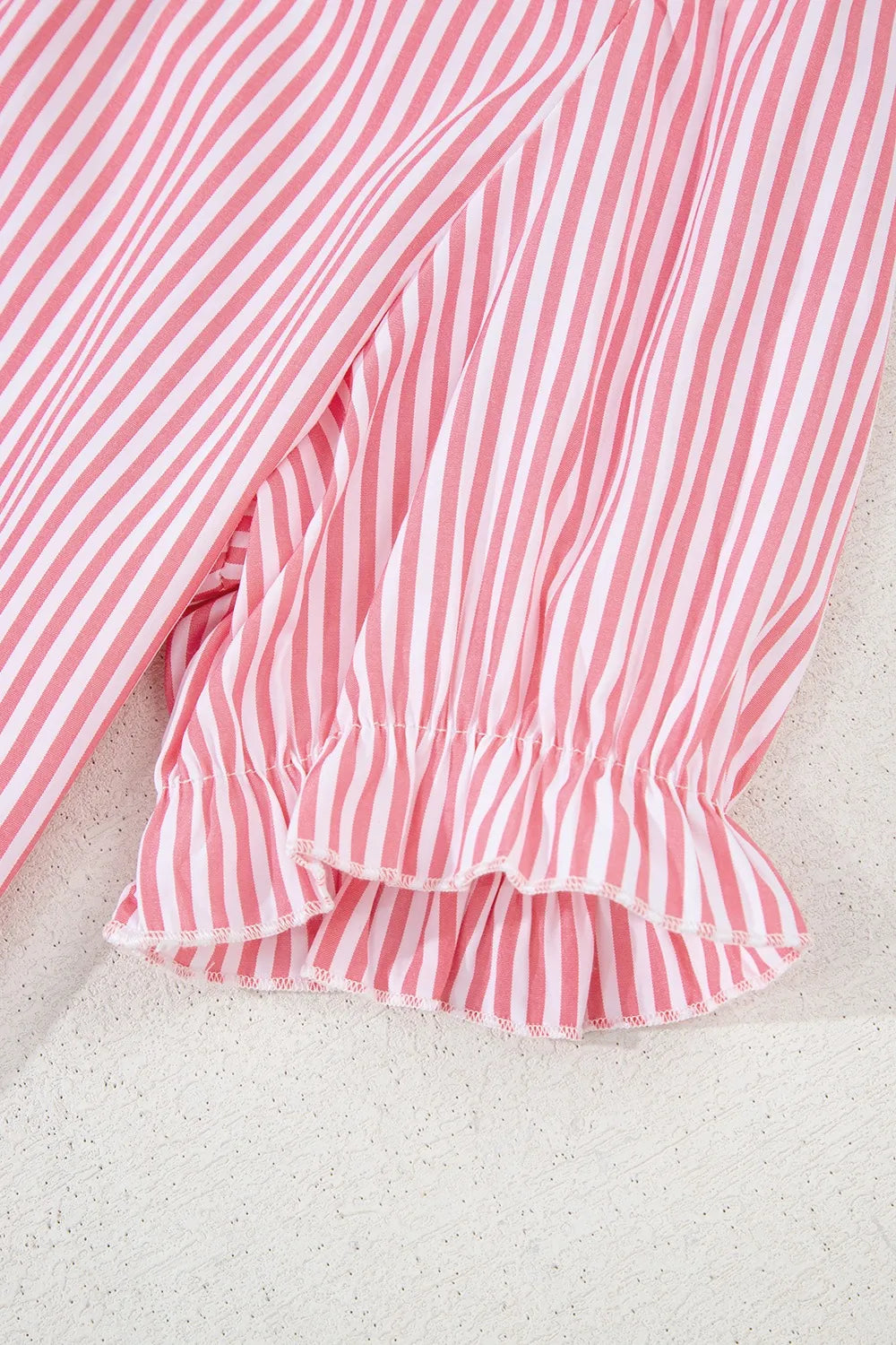 Close-up of frilled short puff sleeve detail
