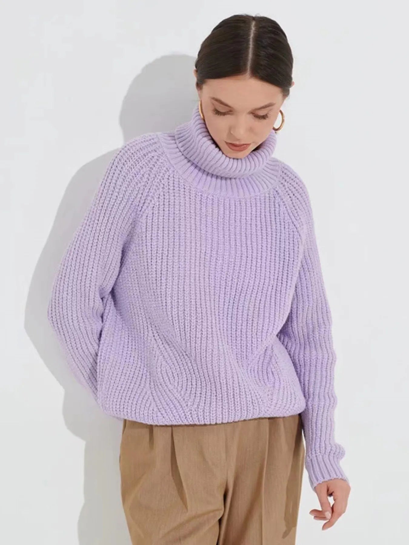 Light purple oversized turtleneck long sleeve sweater front view on model
