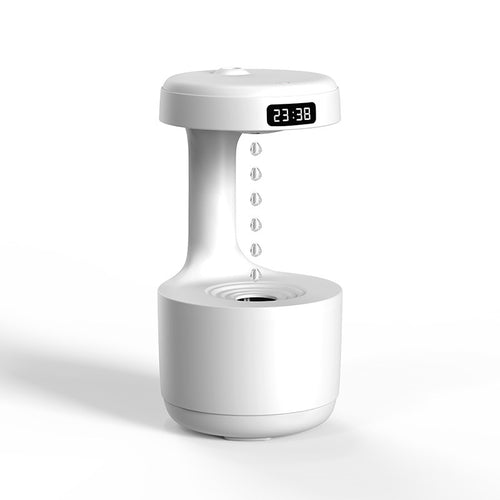 White humidifier in action with digital time display feature
