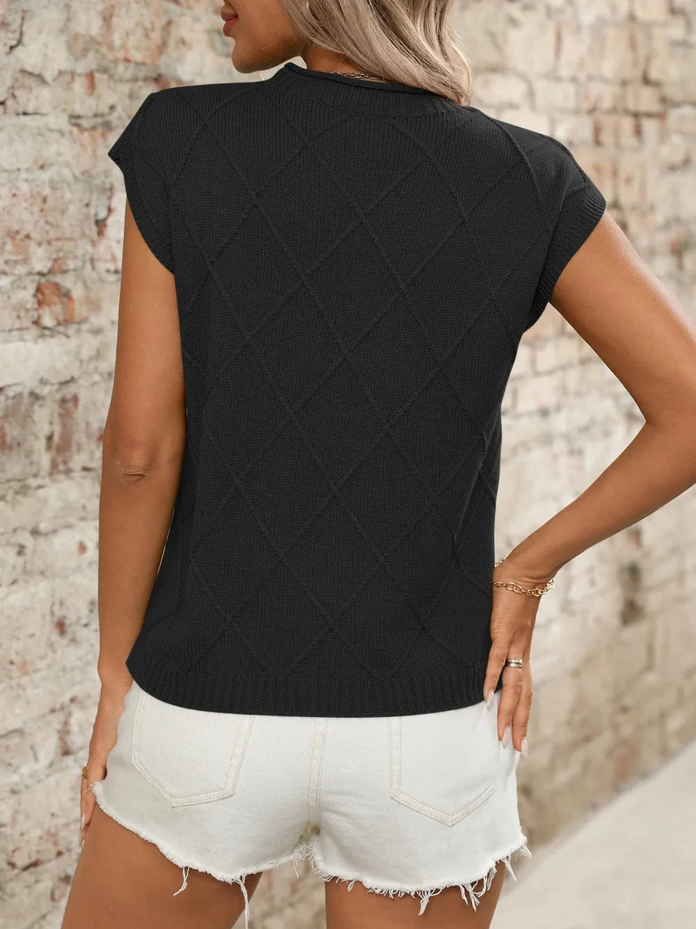 Black round neck cap sleeve knit top back view
