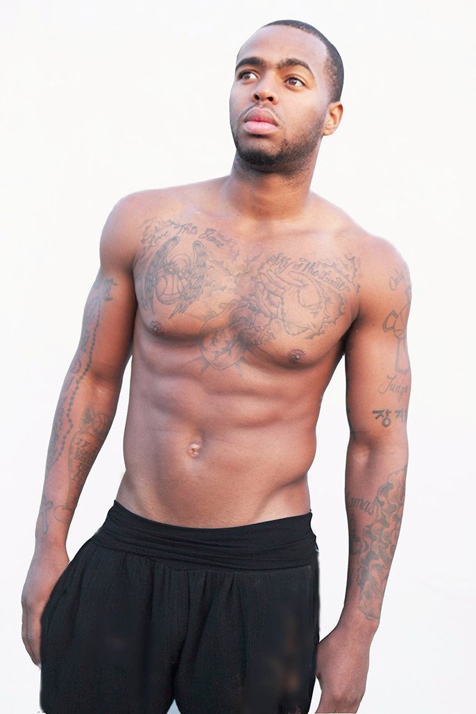 Close up front view of model in black men's yoga kung fu pants long

