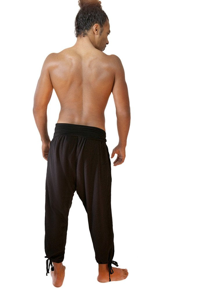 Model wearing black men's yoga kung fu pants long back view
