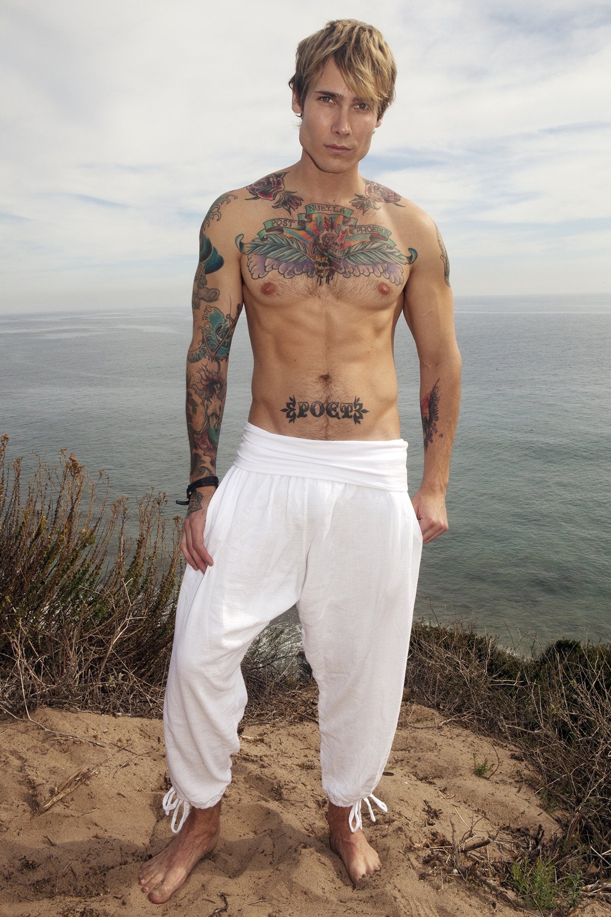 Model wearing white men's yoga kung fu pants long front view
