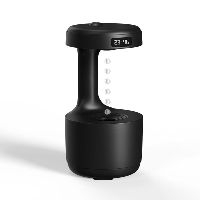 Black humidifier live action with digital time display feature
