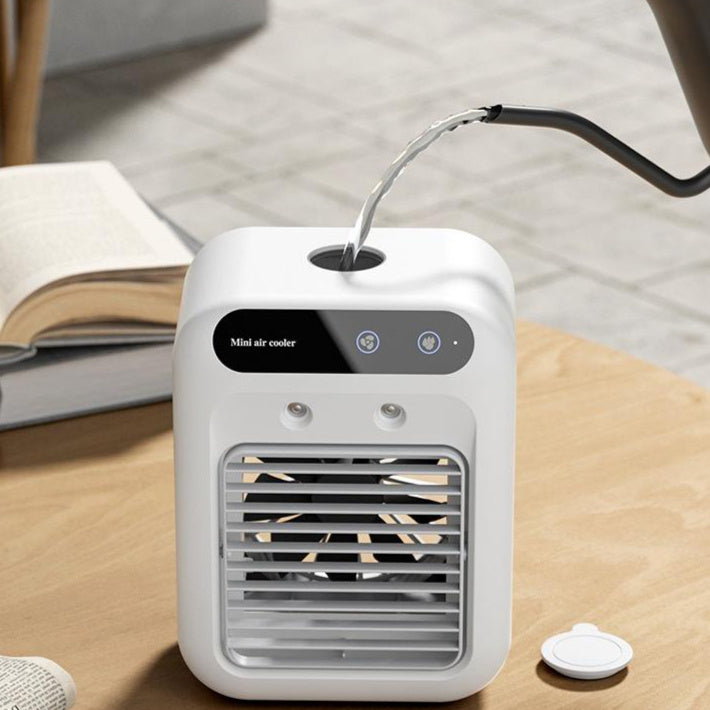 Portable air conditioner water cooling fan being filled with water top view
