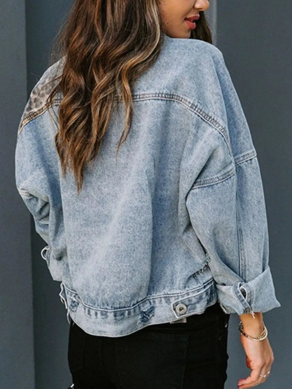 Leopard print denim jacket back view showing drop shoulder design
