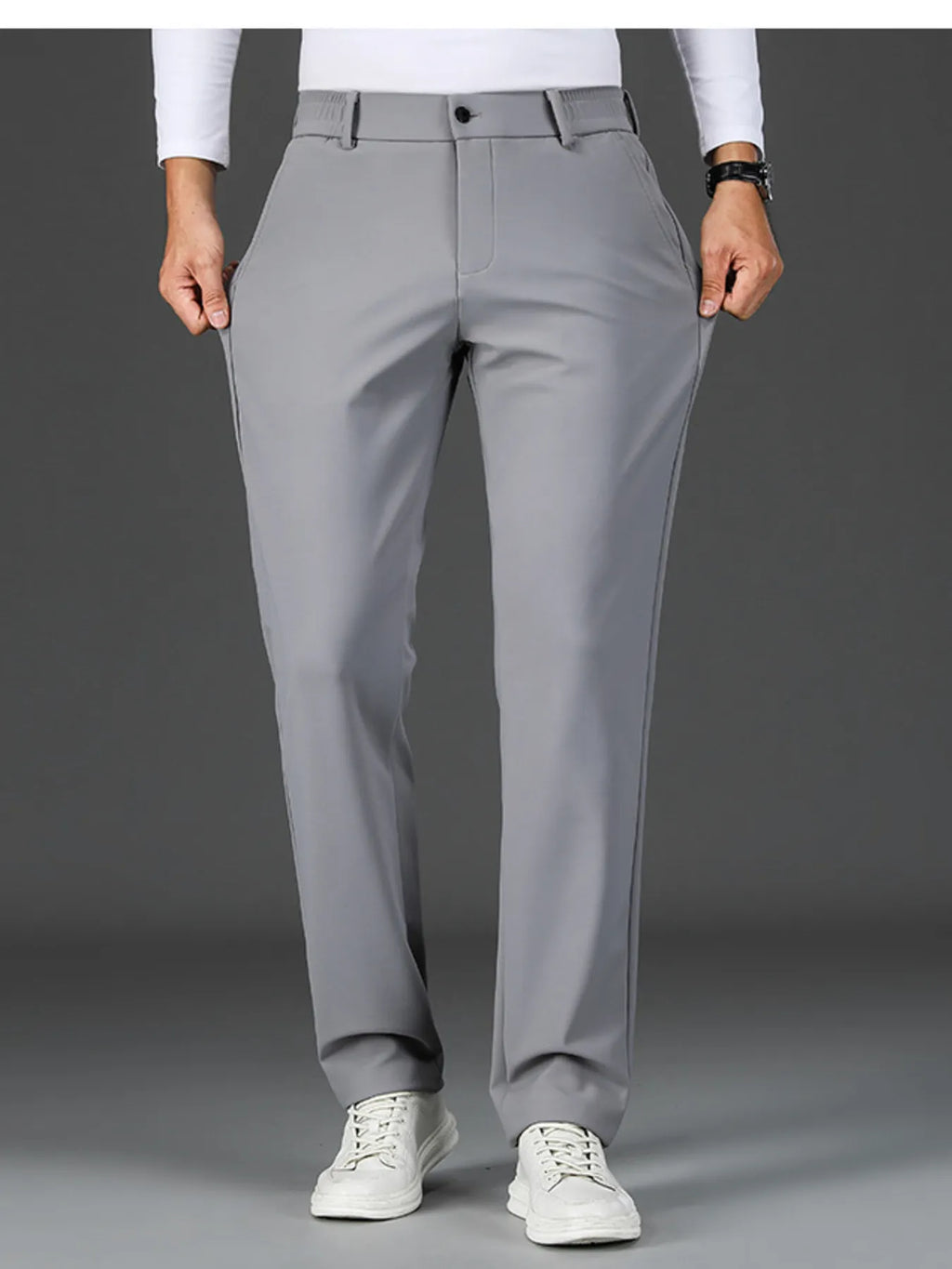 Men's loose fit pants with pockets - front view in grey 
