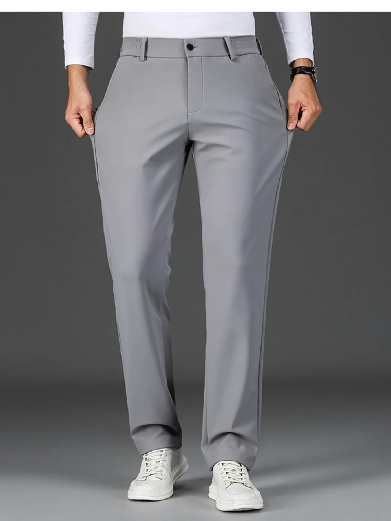 Men's loose fit pants with pockets - front view in grey 
