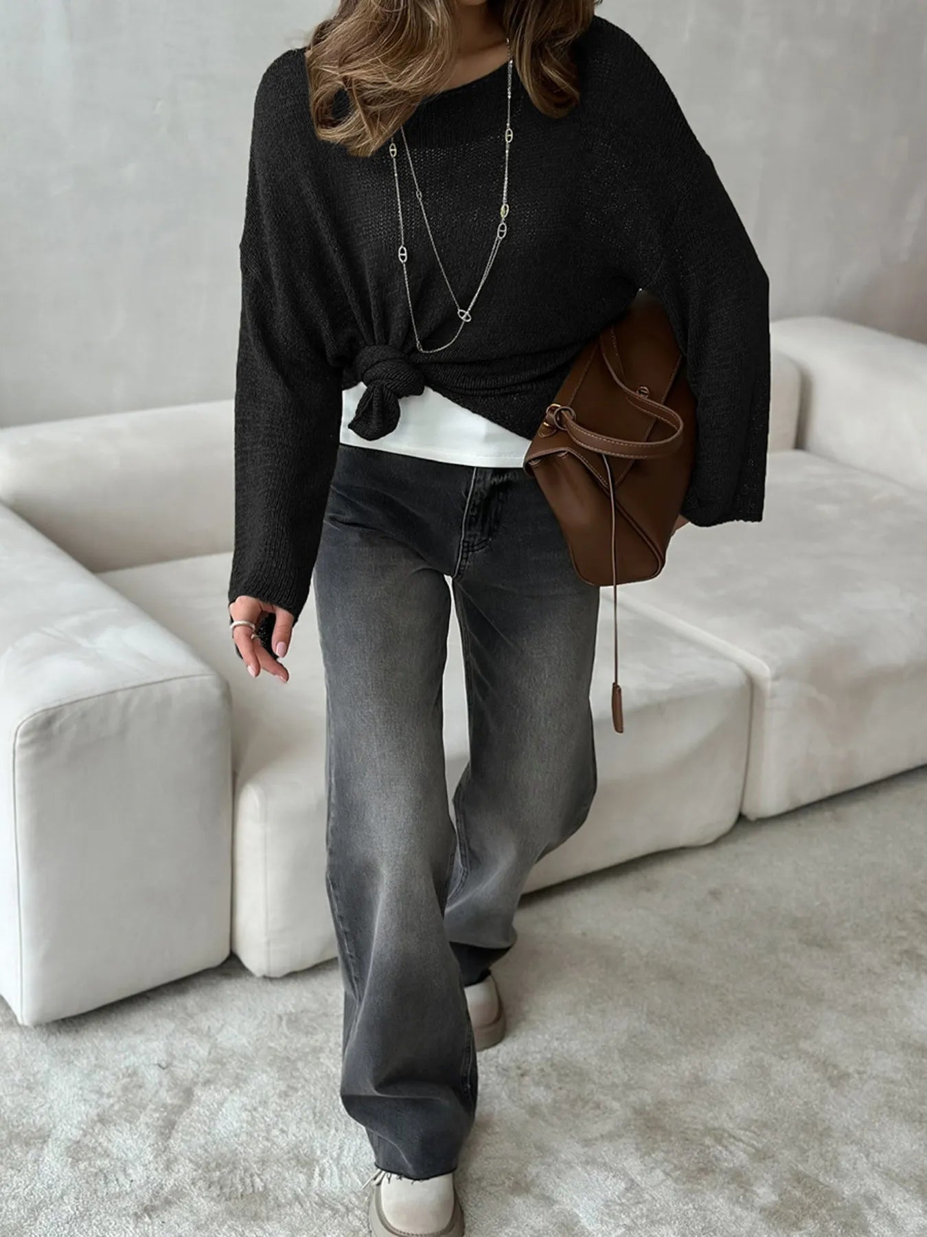 Black knit cover up zoomed out view with knot styling
