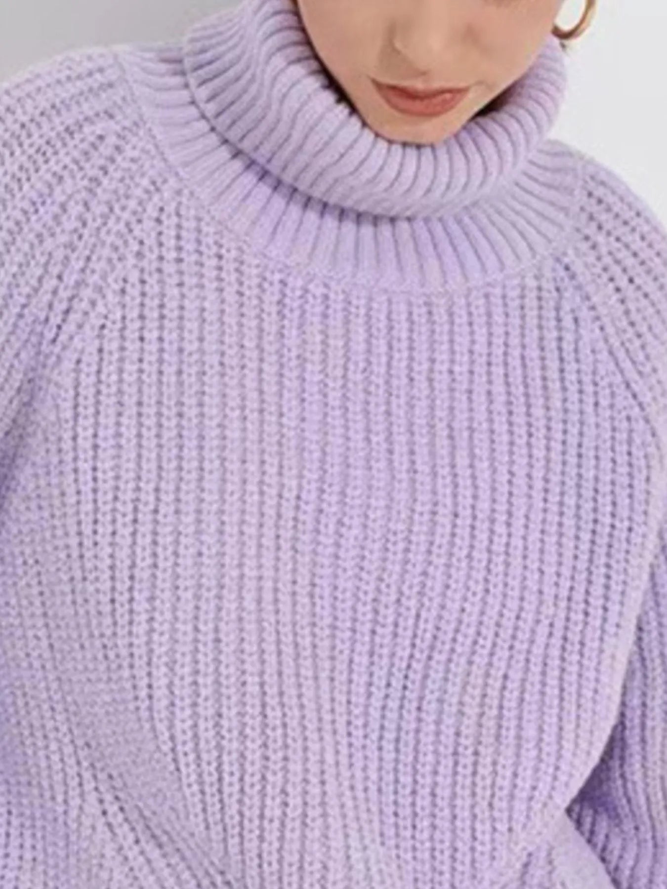 Light purple oversized turtleneck long sleeve sweater collar close-up on model