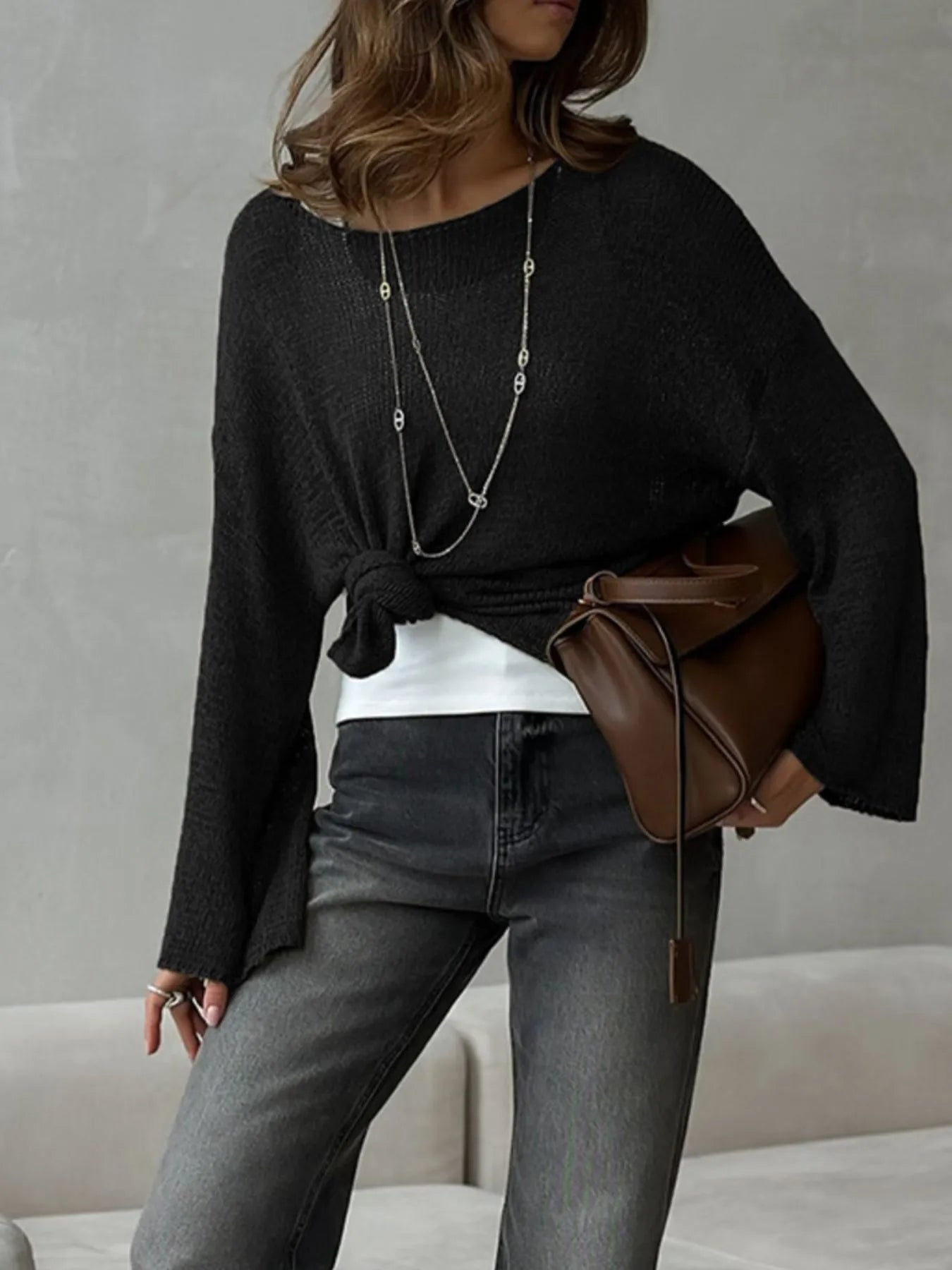 Black knit cover up zoomed out view with knot styling
