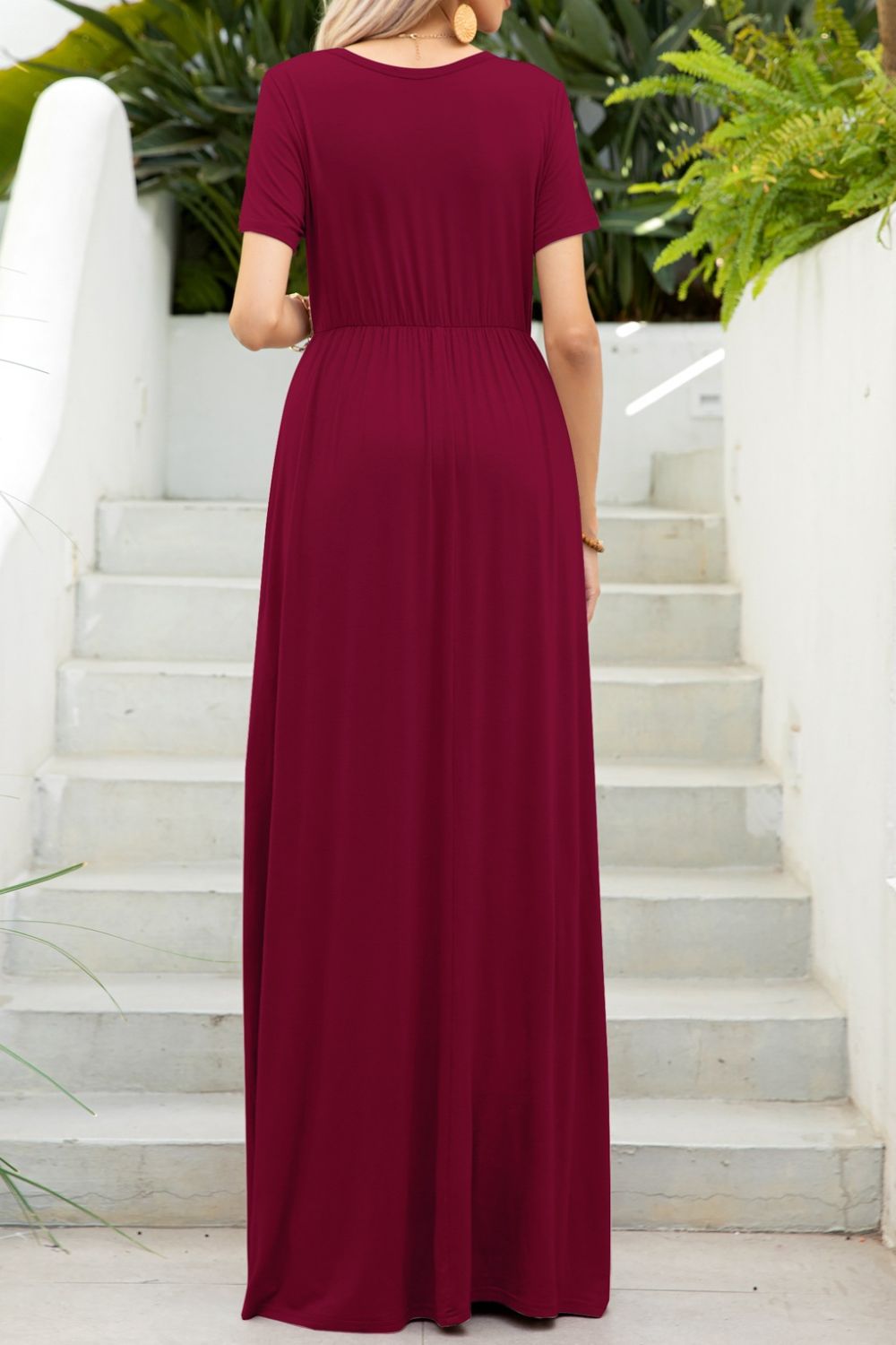 Round neck dress with pockets back view model wearing wine colourway
