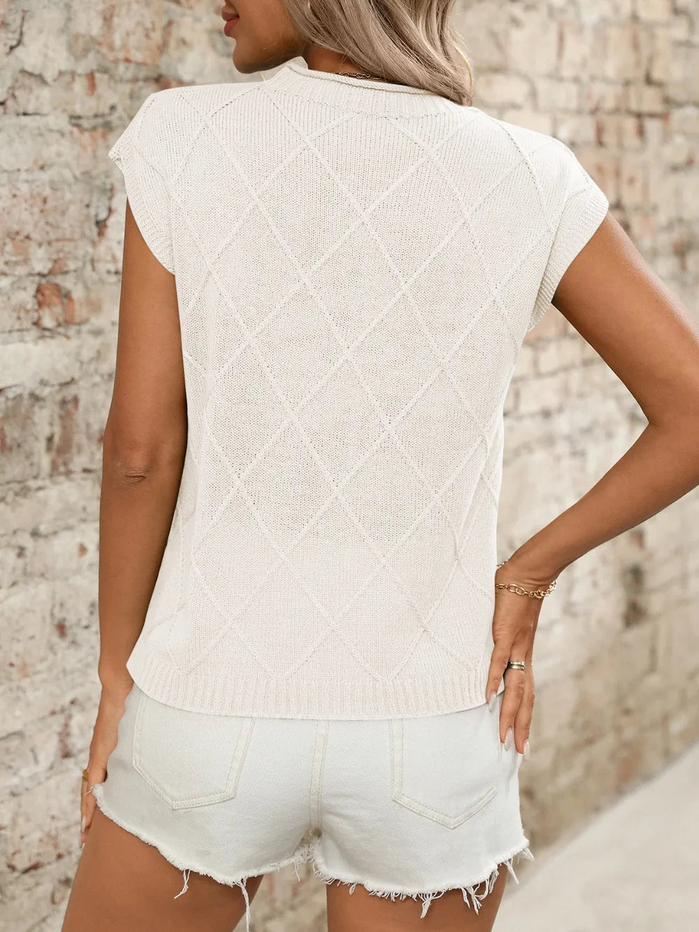Ivory white round neck cap sleeve knit top back view
